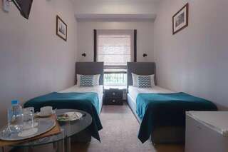 Гостиница Камергерский Москва Бюджетный двухместный номер с 2 отдельными кроватями-1